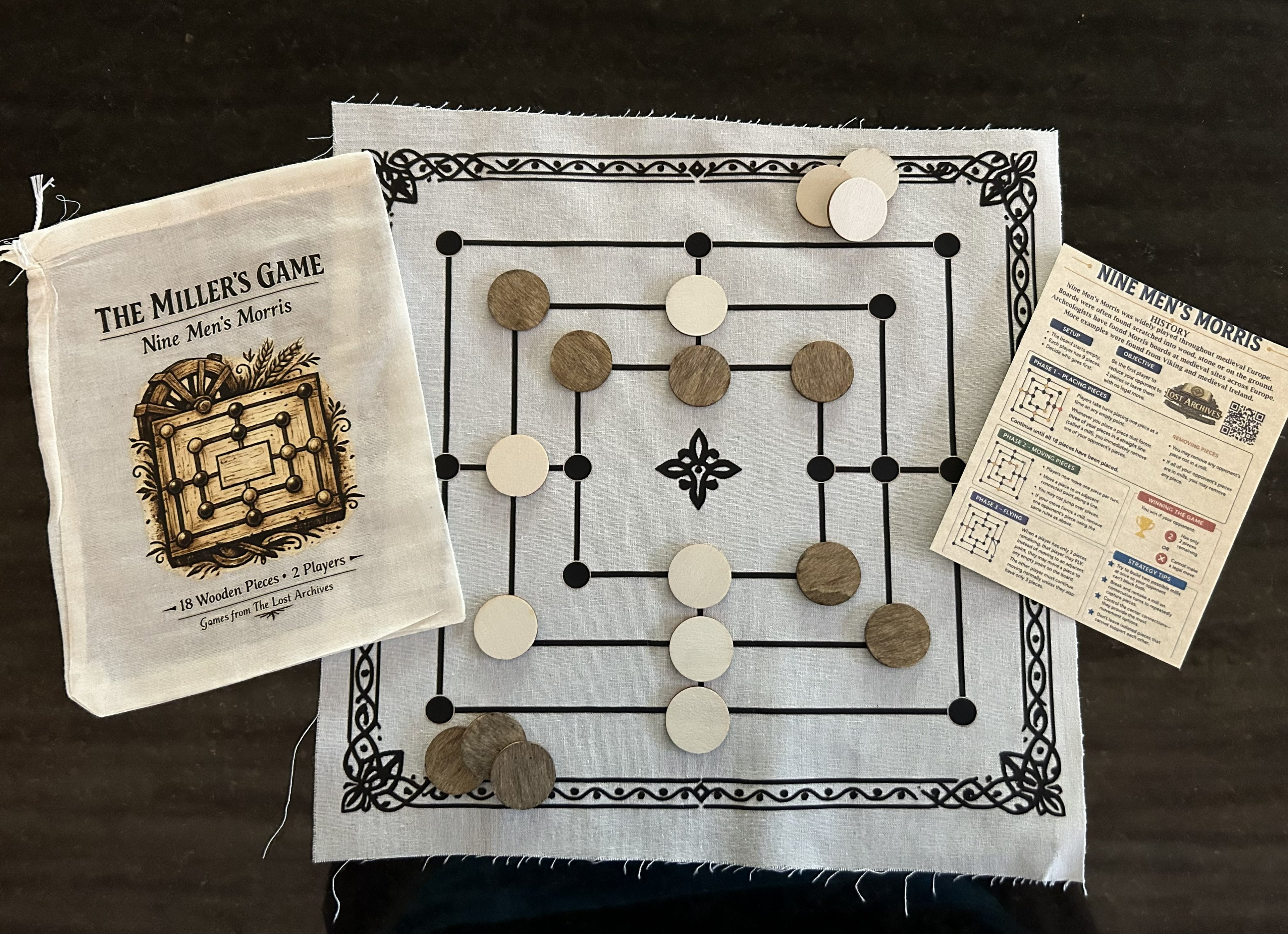 Nine Men's Morris game board, wooden pieces, pouch, and rules card