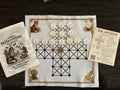 Fox and Geese game board, pieces, pouch, and rules card