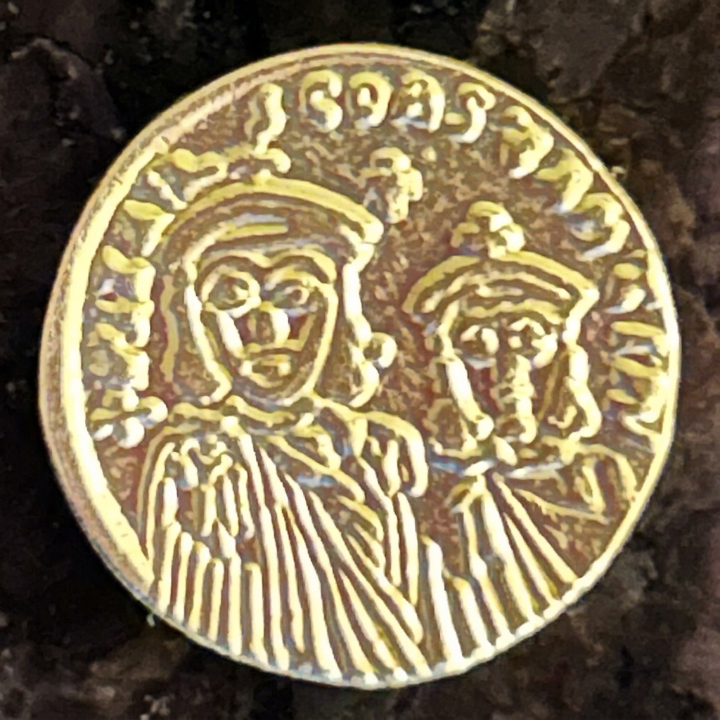 Two crowned imperial figures on a small Byzantine solidus replica